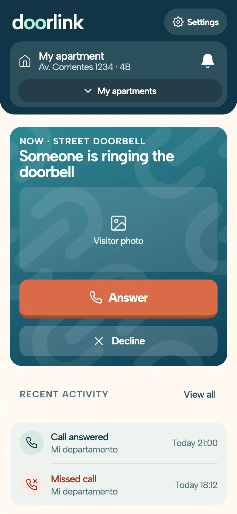 DoorLink app home screen while the doorbell rings: the Someone is ringing the doorbell card with the visitor's photo and the Answer and Decline buttons